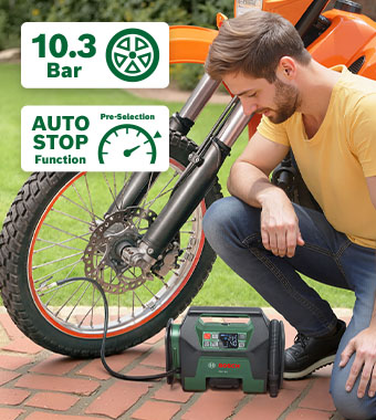Bosch PAO 18V Cordless Air Compressor Pump – 10.3 Bar, Auto-Stop Function Man inflating a motorbike tyre with the Bosch PAO 18V cordless air compressor pump, with 10.3 bar max pressure, auto-stop pressure pre-selection and 3-year MyBosch warranty