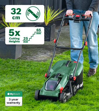 Bosch ROTAK 18V-32 18V Cordless Brushless Lawnmower 320mm – 32cm Cut, 5 Cutting Heights, 3 Year Warranty Bosch ROTAK 18V-32 18V cordless lawnmower in use on a garden lawn – 32cm cutting width, 5 cutting heights 25-65mm, 3 year MyBosch warranty