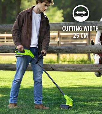 Greenworks ST24B 24V Cordless Grass Trimmer with a 250mm Cutting Diameter Person using the lightweight Greenworks ST24B 24V cordless grass trimmer with a 250mm cutting blade width.
