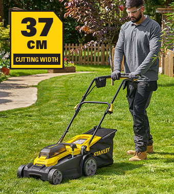 Stanley FatMax SCMWP3701 Cordless Lawnmower 36V – 37cm Cutting Width Stanley FatMax V20 36V cordless lawnmower SCMWP3701 in use on garden lawn – 37cm cutting width