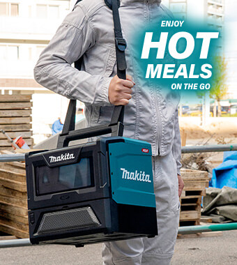 Large carrying handle
provides excellent portability. Makita MW001G XGT Portable Microwave