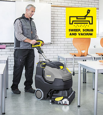 Kärcher BR 45/22 C Bp Pro – sweep, scrub and vacuum in a single pass Operator using a Kärcher BR 45/22 C Bp Pro scrubber dryer to sweep, scrub and vacuum a classroom floor in one pass