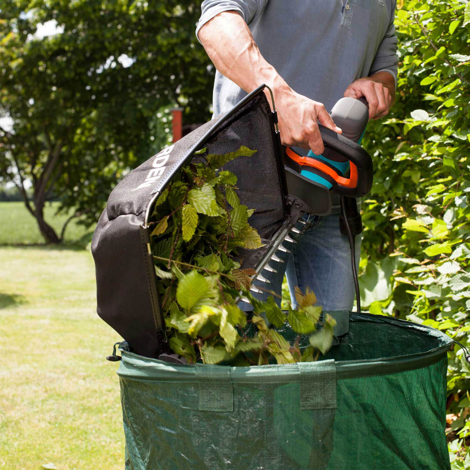 Image of Cordless hedge trimmer with dust bag