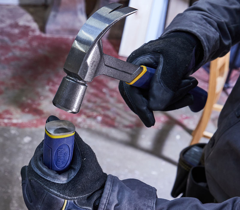 Hitting Wood Chisel with a Hammer